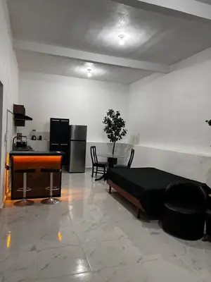 Zona de estar de Loft Moderno y Acogedor