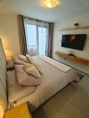 Una televisión o centro de entretenimiento en Comfy Habitación en Puebla!