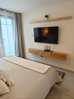 Una televisión o centro de entretenimiento en Comfy Habitación en Puebla!
