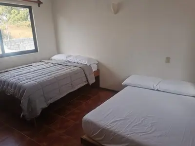 Cama o camas de una habitación en Casa bonita