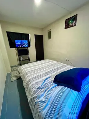 Cama o camas de una habitación en Cómodo departamento en zona céntrica de Puebla