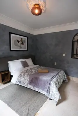 Cama o camas de una habitación en Casa Labardini Suite Colonial en Planta Baja 1