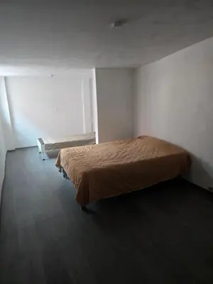 Cama o camas de una habitación en Casa de 1 piso cerca de hospital san alejandro