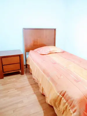 Cama o camas de una habitación en Amplio departamento