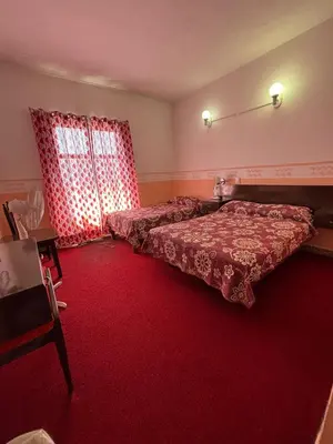 Cama o camas de una habitación en Hotel Mesón del Rey