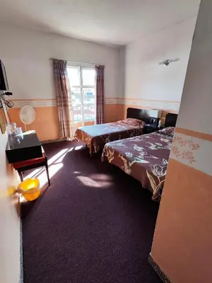 Cama o camas de una habitación en Hotel Mesón del Rey
