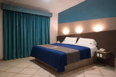 Cama o camas de una habitación en Autohotel Punto de Descanso Cordoba