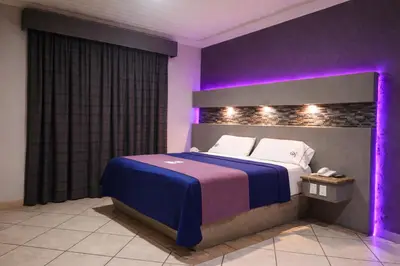 Cama o camas de una habitación en Autohotel Punto de Descanso Cordoba