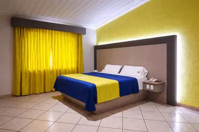 Cama o camas de una habitación en Autohotel Punto de Descanso Cordoba