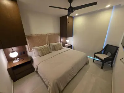 Cama o camas de una habitación en Condo 2 recámaras a pasos de playa Santa Cruz