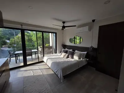 Cama o camas de una habitación en Estudio a pasos de playa Santa Cruz