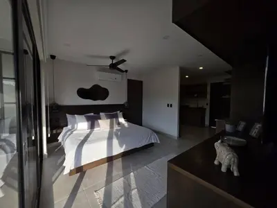 Cama o camas de una habitación en Estudio a pasos de playa Santa Cruz