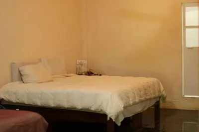 Cama o camas de una habitación en El jardin