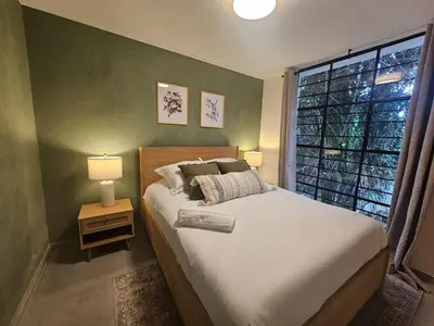 Cama o camas de una habitación en Casa Te Adoro Coyoacan
