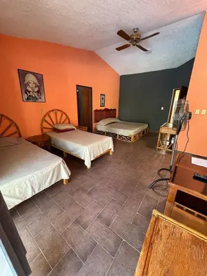 Cama o camas de una habitación en Villa Willeska en lomas de Cocoyoc, con alberca, jacuzzi y enormes areas verdes