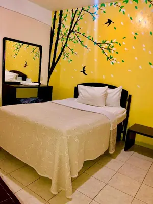 Cama o camas de una habitación en Hotel MERLI