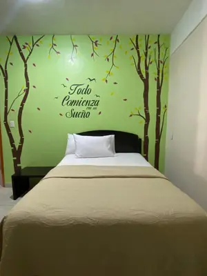 Cama o camas de una habitación en Hotel MERLI