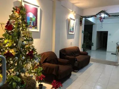 Zona de estar de Hotel MERLI