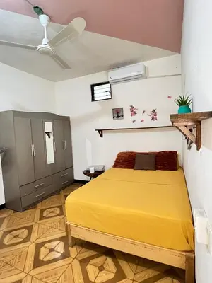 Cama o camas de una habitación en guiba casa en Puerto Escondido