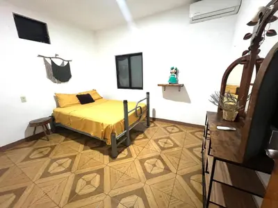 Cama o camas de una habitación en guiba casa en Puerto Escondido