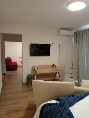 Una televisión o centro de entretenimiento en Casa Guadalupe Robles