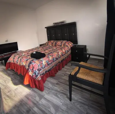 Cama o camas de una habitación en Hospedaje Don Juve