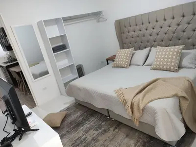 Cama o camas de una habitación en Cozy Apartamento en Puebla!