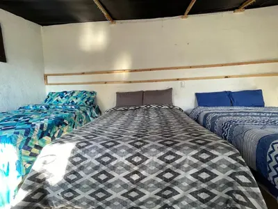 Cama o camas de una habitación en Casa de las montañas