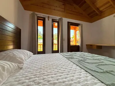 Cama o camas de una habitación en Cabañas Tlaxomolco