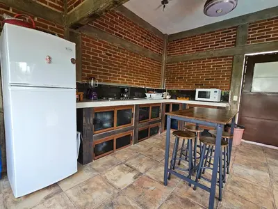 Una cocina o zona de cocina en Casa Temazcal Madre Tierra