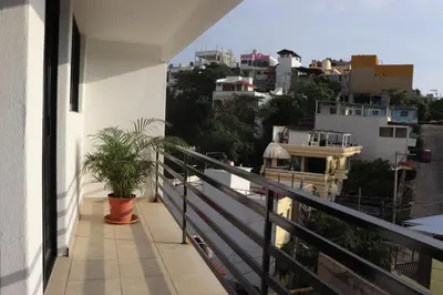 Un balcón o terraza de La Perla residencia completa 3 habitaciones