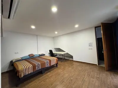 Cama o camas de una habitación en La Perla residencia completa 3 habitaciones