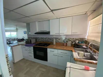 Una cocina o zona de cocina en Cómodo Departamento