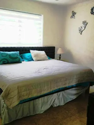 Cama o camas de una habitación en ACAPULCO DIAMANTE 3 BEDROOMs EACH WITH BATHROOM, & GYM