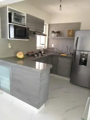 Una cocina o zona de cocina en ACAPULCO DIAMANTE 3 BEDROOMs EACH WITH BATHROOM, & GYM