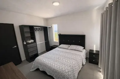 Cama o camas de una habitación en PH Puerta al Sol