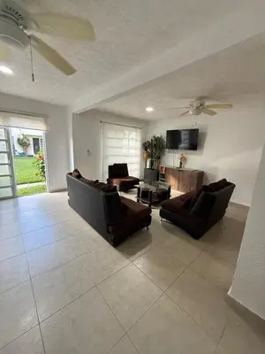Una televisión o centro de entretenimiento en Condominio Casa, Puente del Mar, Casa Privada