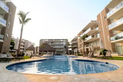 Piscina en o cerca de Acapulco Diamante Departamento de ensueño con acceso a playa
