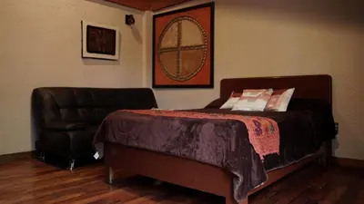 Cama o camas de una habitación en Hotel Coyoacan