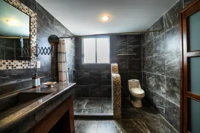 Un baño de HOTEL XIADANI Restaurante, Temazcal & Spa