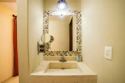 Un baño de HOTEL XIADANI Restaurante, Temazcal & Spa