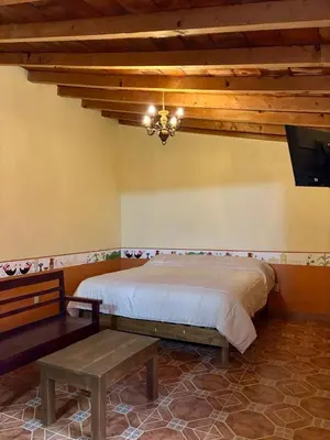 Cama o camas de una habitación en Hotel-Posada Kali Tlayacapan