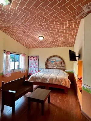 Cama o camas de una habitación en Hotel-Posada Kali Tlayacapan