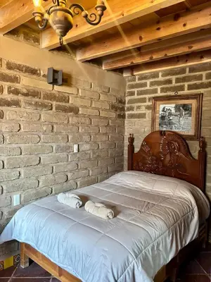 Cama o camas de una habitación en Hotel-Posada Kali Tlayacapan