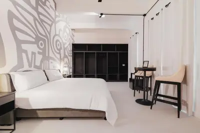Cama o camas de una habitación en Cocoon Oaxaca City- Curated Stay In Oaxaca Centro