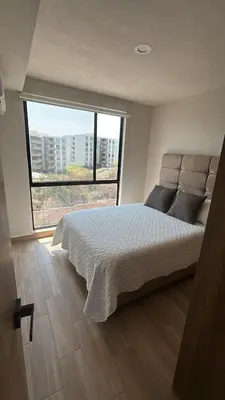 Cama o camas de una habitación en Santa Fe Dorado Atardecer