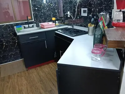 Una cocina o zona de cocina en Departamento Playa Mocambo