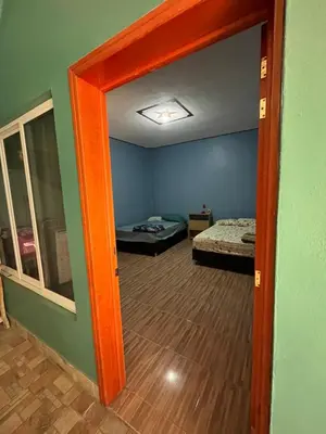 Cama o camas de una habitación en La casa de coco