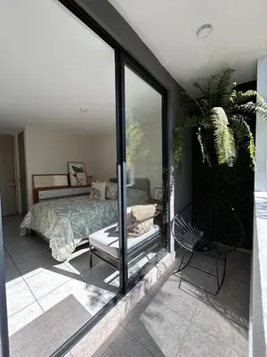 Zona de estar de Departamento cerca Aeropuerto CDMX foro GNP y metro a pasos