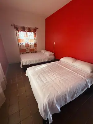 Cama o camas de una habitación en Casa Pelícanos playa de chachalacas